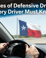 Driver holding a steering wheel on a Texas highway with a Texas flag, illustrating the five rules of defensive driving – blog hero image.